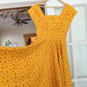 A-line yellow dress with dainty pink flowers